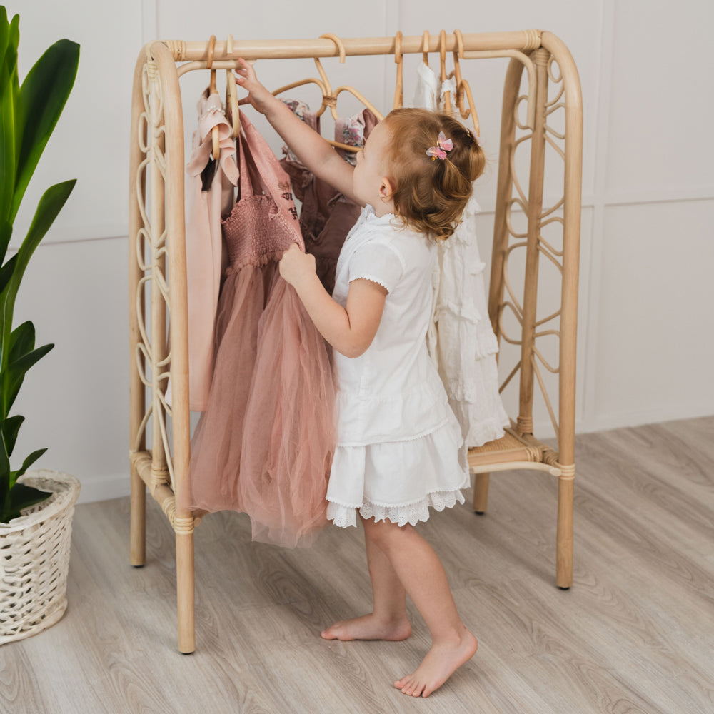 Rattan Clothing Rack | Girl Putting Clothes in Belle Kids Clothing Rack | MOMIJI