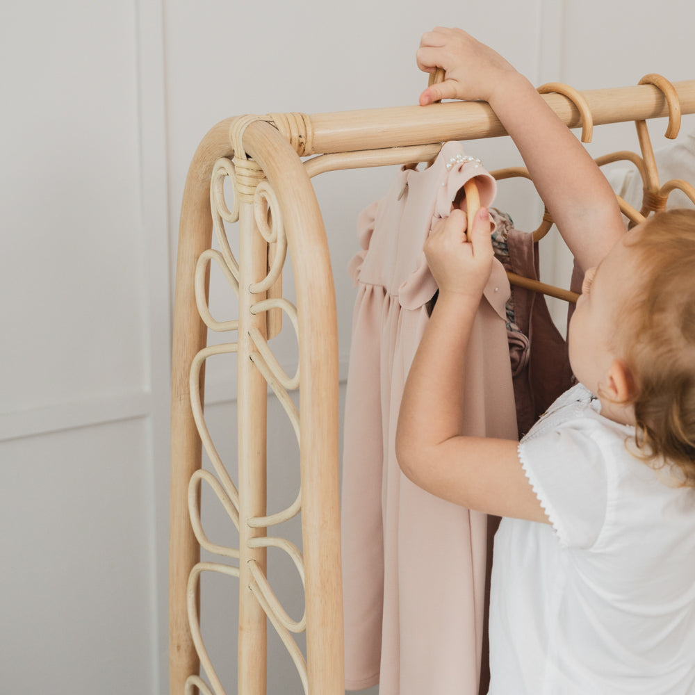 Rattan Clothing Rack | Girl Putting Clothes in Belle Kids Clothing Rack | MOMIJI