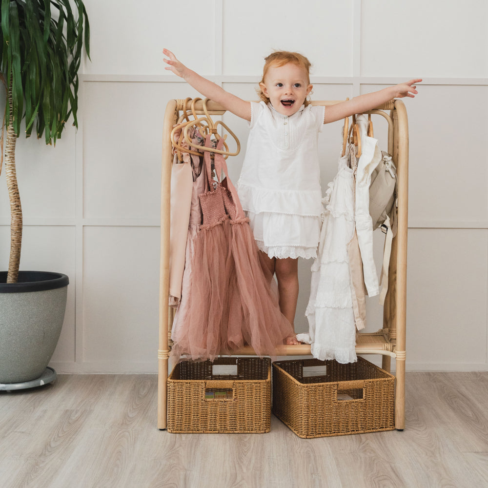 Rattan Clothing Rack | Toddler Girl Standing on Belle Kids Clothing Rack | MOMIJI