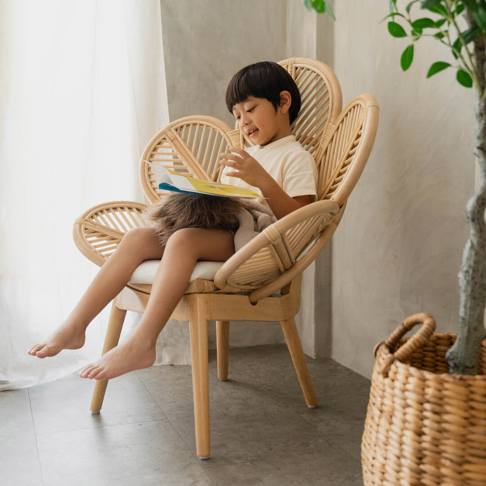 Rattan Chair | Petal Kids Chair | Child sitting on Wicker Chair  and reading | MOMIJI