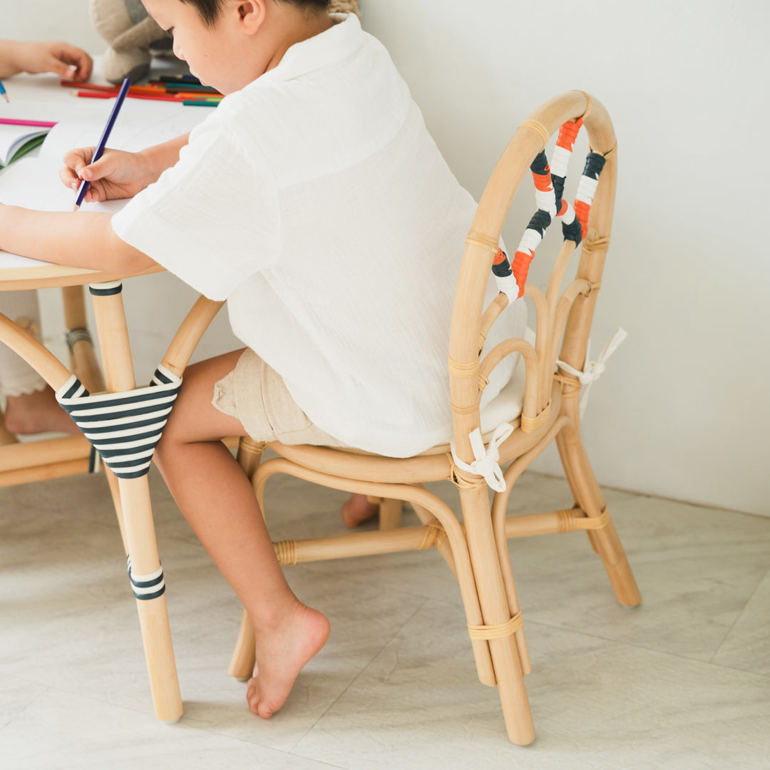 Rattan Chairs | Quentin Kids Chair | Child sitting on Wicker Chair | MOMIJI